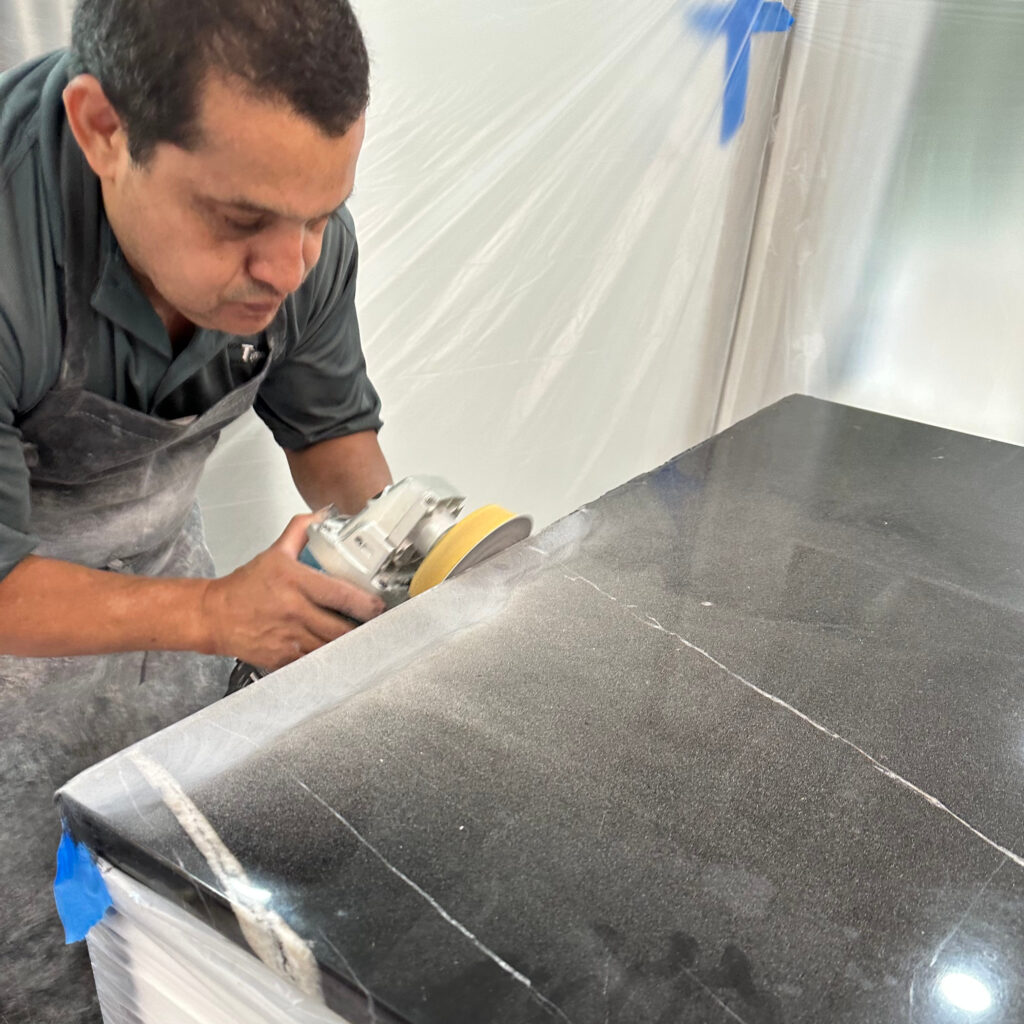 Stone repair expert fixing cracked countertop