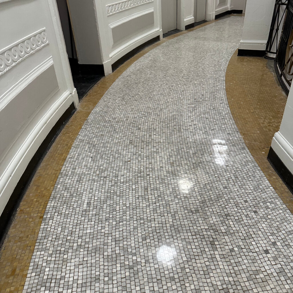 Repaired and polished stone surface pieces in office building